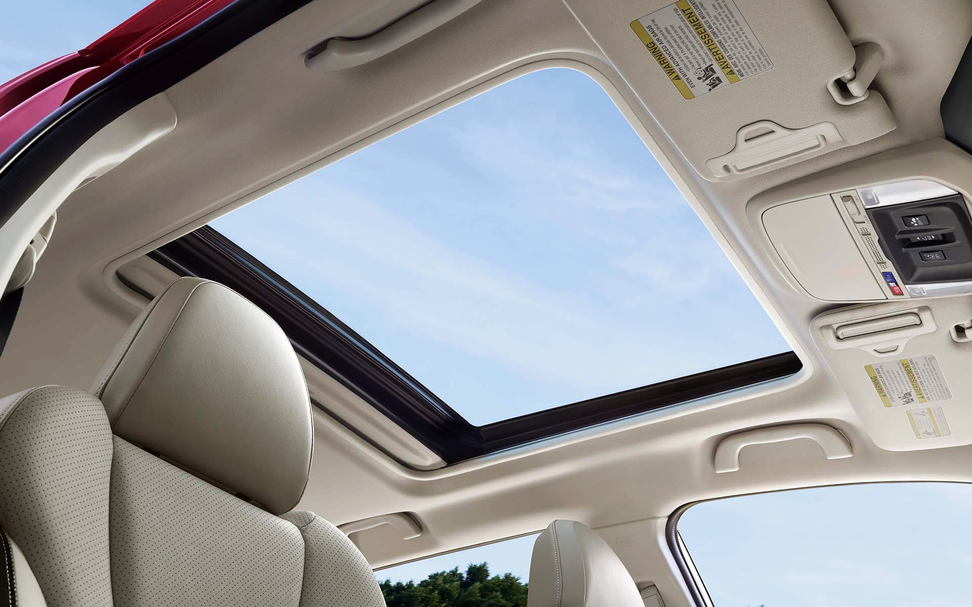 A view through the power sliding panoramic moonroof on the 2022 Forester Sport. | Valley Subaru of Longmont in Longmont CO