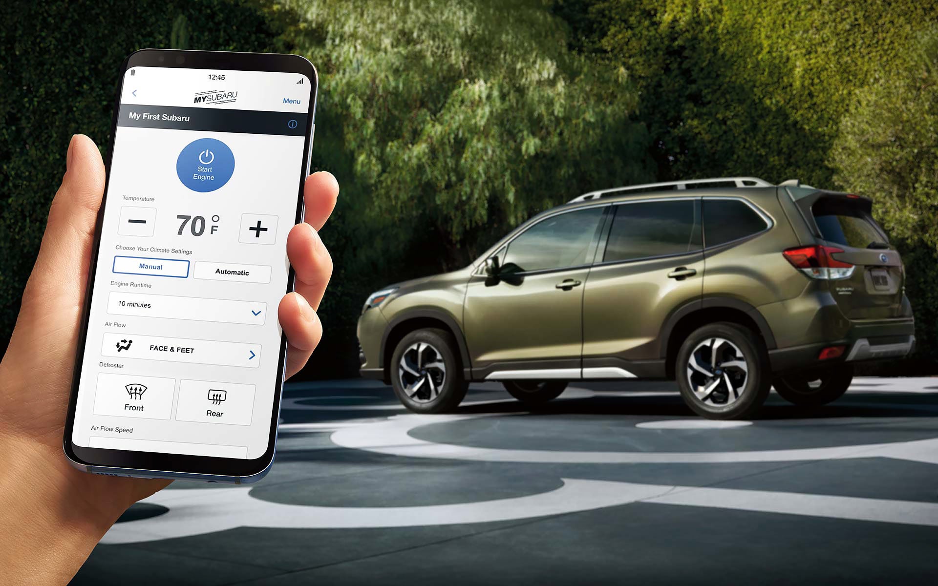A close-up of a phone showing the Remote Engine Start with Climate Control feature of SUBARU STARLINK® Safety and Security available on the 2022 Forester. | Valley Subaru of Longmont in Longmont CO