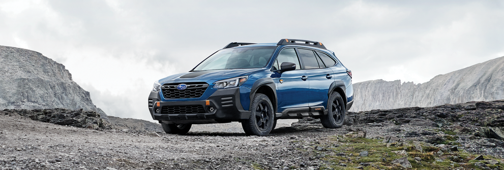 A 2023 Outback Wilderness parked in the mountains. | Valley Subaru of Longmont in Longmont CO
