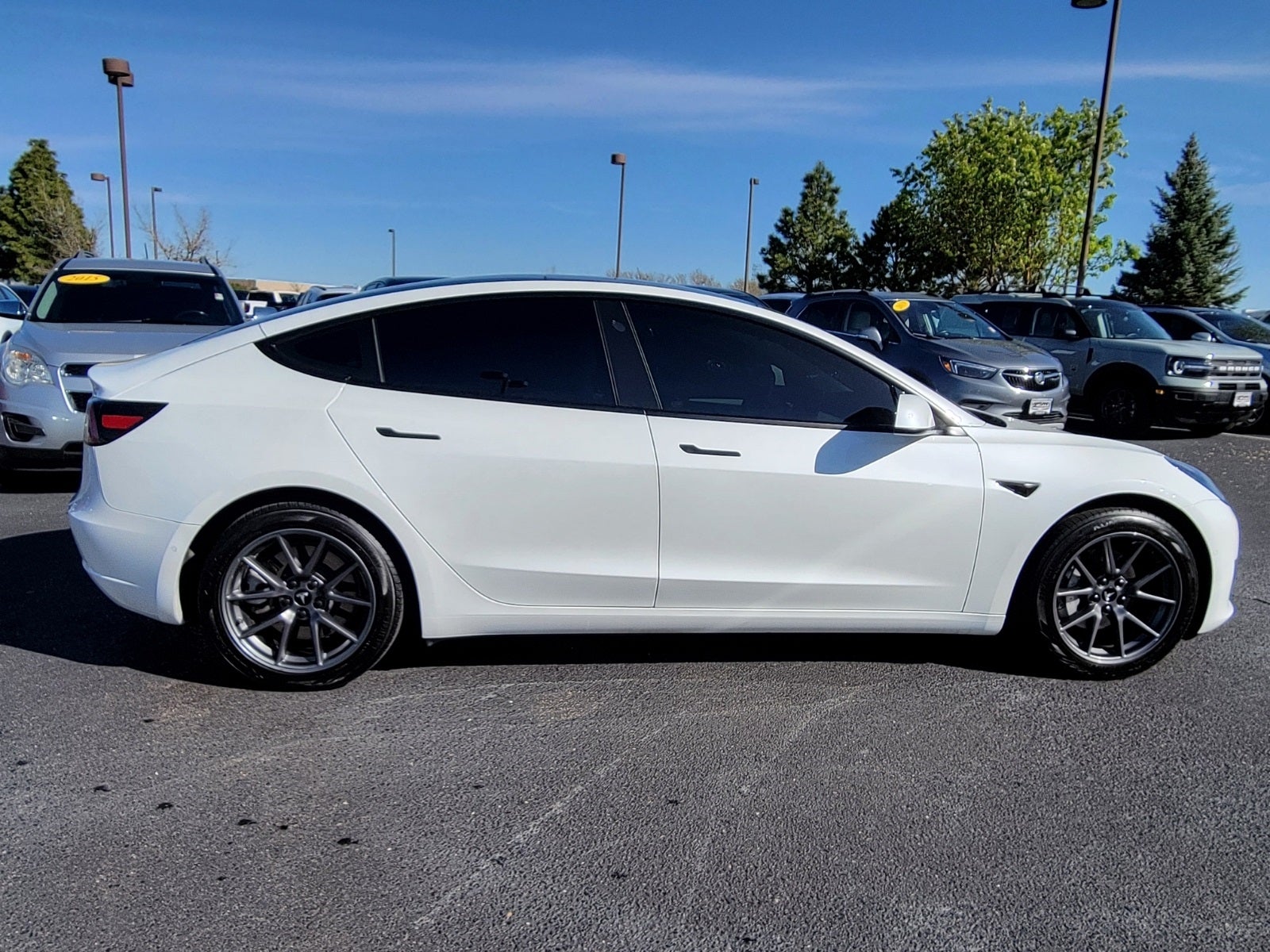 Used 2021 Tesla Model 3  with VIN 5YJ3E1EB1MF051075 for sale in Longmont, CO